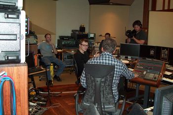 Control room gang listening to playback
