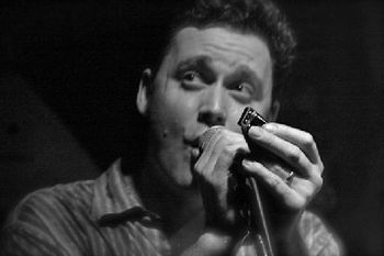 "Hey everyone! I have a harmonica!" Tom at Godfreys. Photo Lisa Koza
