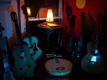 Stringed instruments in blue and golden light. Thanks to Tom Dubas and David Davidson @ www.webuyguitars.net and Stan Jay & Leroy Aiello @ Mandolin Bros. www.mandoweb.com
