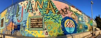 A brightly painted mural lends to the jubilant atmosphere at a seaside playground in Zuljana, Croatia. This is where PCD joined Barbara Dive Centre to film underwater scenes for his "Wine Diving in Croatia" documentary. Paul Cater Deaton Photo
