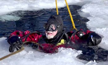 "Breaking the ice" in Michigan's Upper Peninsula, PCD underwent training in drysuit and ice diving with Bob Berg. Photo: Brian Bangert
