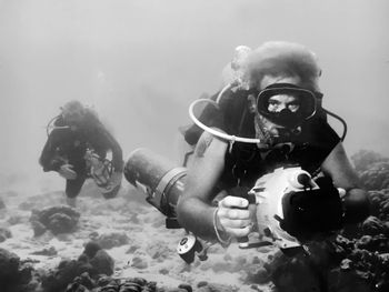 Rigged with sidemount, Walter Stark and PCD head into the depths during production of "Come. Explore." for Captain Don's Habitat, Bonaire's home of diving freedom. Wilco Landzaat Photo
