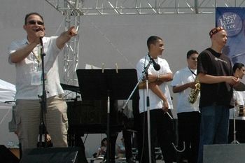 Arturo and John join the group onstage 2005
