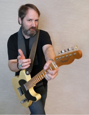 Glen Smith, Guitar & Vocals - Joined TD in 2014.  Also an esteemed member of Pet Rock and Grammy Award-Winning, Mannheim Steamroller.
