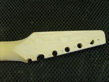 The headstock had been modified from the original 6-in-line tuner arrangement, to a 3-per-side type headstock, complete with added wood, which was removed before I received the neck in for repair....
