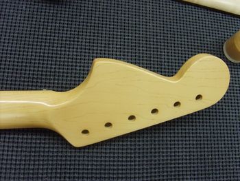 Here, you can see where I've began to paint the maple grain over top of the tinted basecoat....
