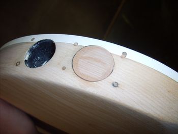 The old stereo Ric-O-Sound hole was plugged with maple.  The bass will have only one output jack....
