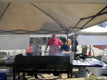 Norm Schneiderhan and others cooking for the all the truckers outside parking lot. Great job guys!
