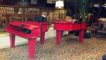 Red Pianos in Grand Geneva Lobby
