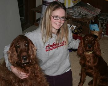 Katie with Gigi (gray girl) in Arkansas. Molly (the 11 yr old setter) wasn't to pleased with a obnoxious puppy! (Feb 10)
