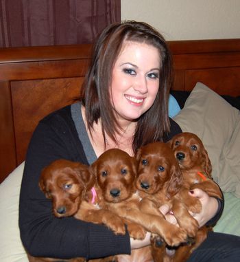 My daughter Samantha with the puppies. Aren't those just the cutest faces!!
