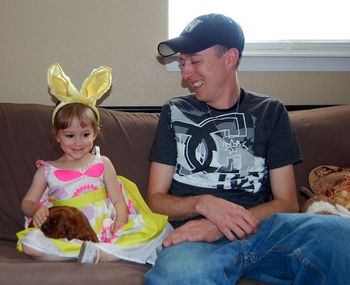 My son and his daughter came over for Easter. Payton really enjoyed playing with the puppies. 4/12
