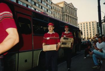 Boys delivering busload of Big Macs.
