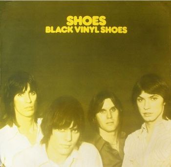 Cover for the German re-release of "Black Vinyl Shoes" on Line Records in 1981.
