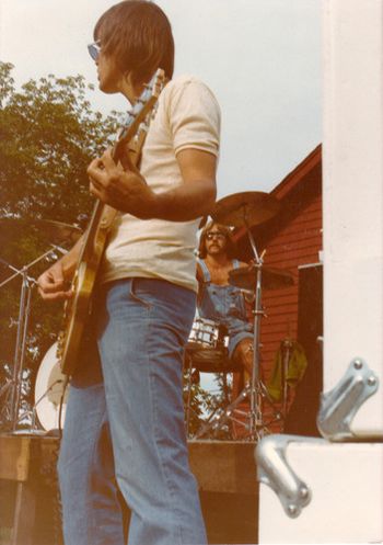 Gary plays his Ibanez Artist guitar at an outside gig in the late summer of 1977.
