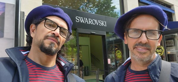 Sidow Sobrino with husband Richard in front of Swarovski on The Avenue des Champs-Élysées in Paris, France