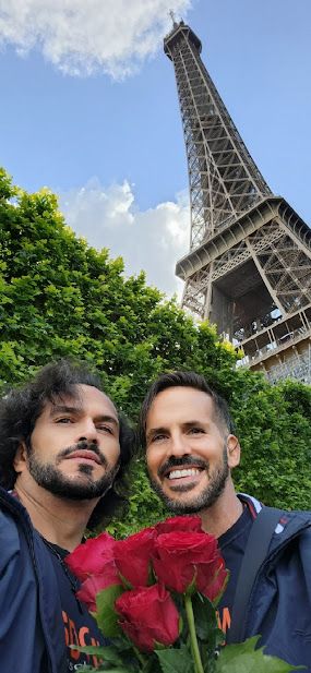 Sidow Sobrino with husband Richard in front of la tour Eiffel in Paris, France
