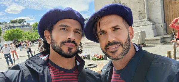 Sidow Sobrino with husband Richard at  the eternal flame beneath the Arc de Triomphe monument in Paris, France