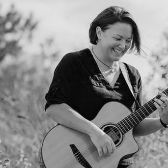 Nicole Equerme - Singer/Writer performs on Mandolin, Banjo and Acoustic guitars in Classical, Folk and Americana Styles.