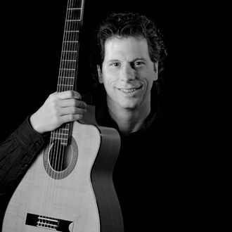 Mike Petrovich- Performs Latin Style Guitar and Smooth Jazz on acoustic guitars.