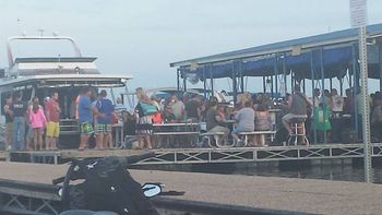 On the water -- Playing to boatloads of summer partiers at Latitude 41 at Saylorville Lake, the only floating bar and grill I have ever played.  Photo courtesy of Lysa Youngquist
