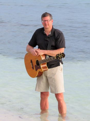 "Where's my pedal?" -- Wading around in the ocean outside of Rum Point, Cayman Islands, BWI before a show.

