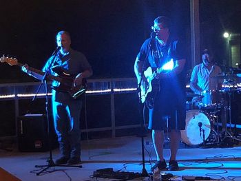 Rockin' the patio at Confluence -- Enjoying a hot summer night outside with a large crowd at Confluence Brewing Company in August, 2019.
