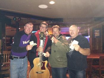 Rabbit Punch rides again - Nice to see the old bandmates again in October, 2014 after a show at Wellman's Pub in Des Moines.  The dollar bills in our hands represent our combined income during our reign in the late 90's and early 2000's.  Rock star pay...

