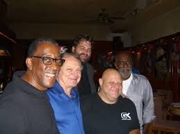 At Charlie O's in Sherman Oaks with Roy McCurdy, Mike Price, Kevin "Brandino" Brandon, and John Heard.
