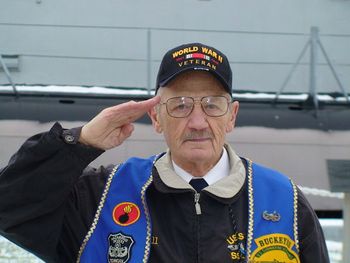 Mr. W. William Walzer snapping a salute. I was so touched by this dear man as he recounted tearfully, sixty years later, how "...my buddies died in my arms." God bless you, William. You and your buddies will never be forgotten.
