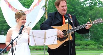 Playing a song at our wedding on May 26, 2012.
