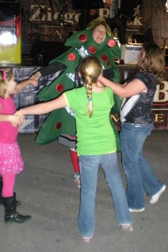 The Tannenbaum joined the youngsters in rockin' around the Christmas tree. Tomball 2011
