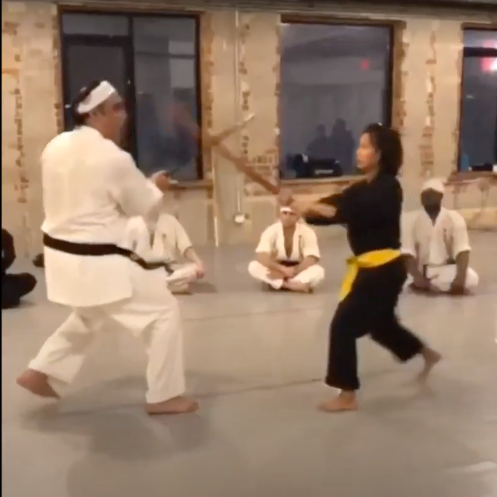 Lynn Kuo - in the karate dojo with boken