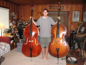 Josh stopping by to show us his brand new bass. He has it next to Benita's old Kay bass on the right.
