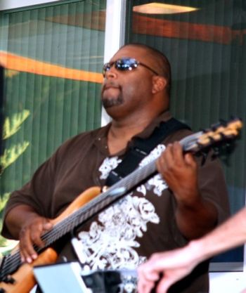 Kevin Cain holding down the Bass for WestBound Groove at the Ford's 59th birthday party
