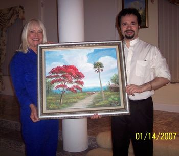 Movie Actress CHRIS NOEL and MAZZ www.ChrisNoel.com (Chris is picking up her Royal Poinciana Tree painting)
