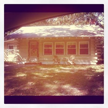 this is a photo of the log cabin I grew up in in NJ. the photo was by my friend Janine. She did a drive by for me.
