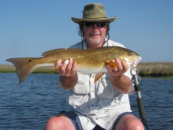 Rick from West Virginia with his first big Cedar Key Redfish.
