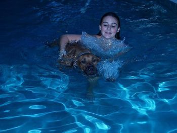 My daughter Taylor and Roxy swimming

