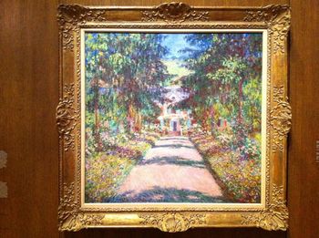 Monet! The Main Pathway at Giverney, 1900. The photo really doesn't capture the rich, shimmery colours of this delectable painting.
