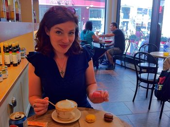 Loving Quebec's cafe culture! Allison savouring cappuccino & traditional French macaroons.
