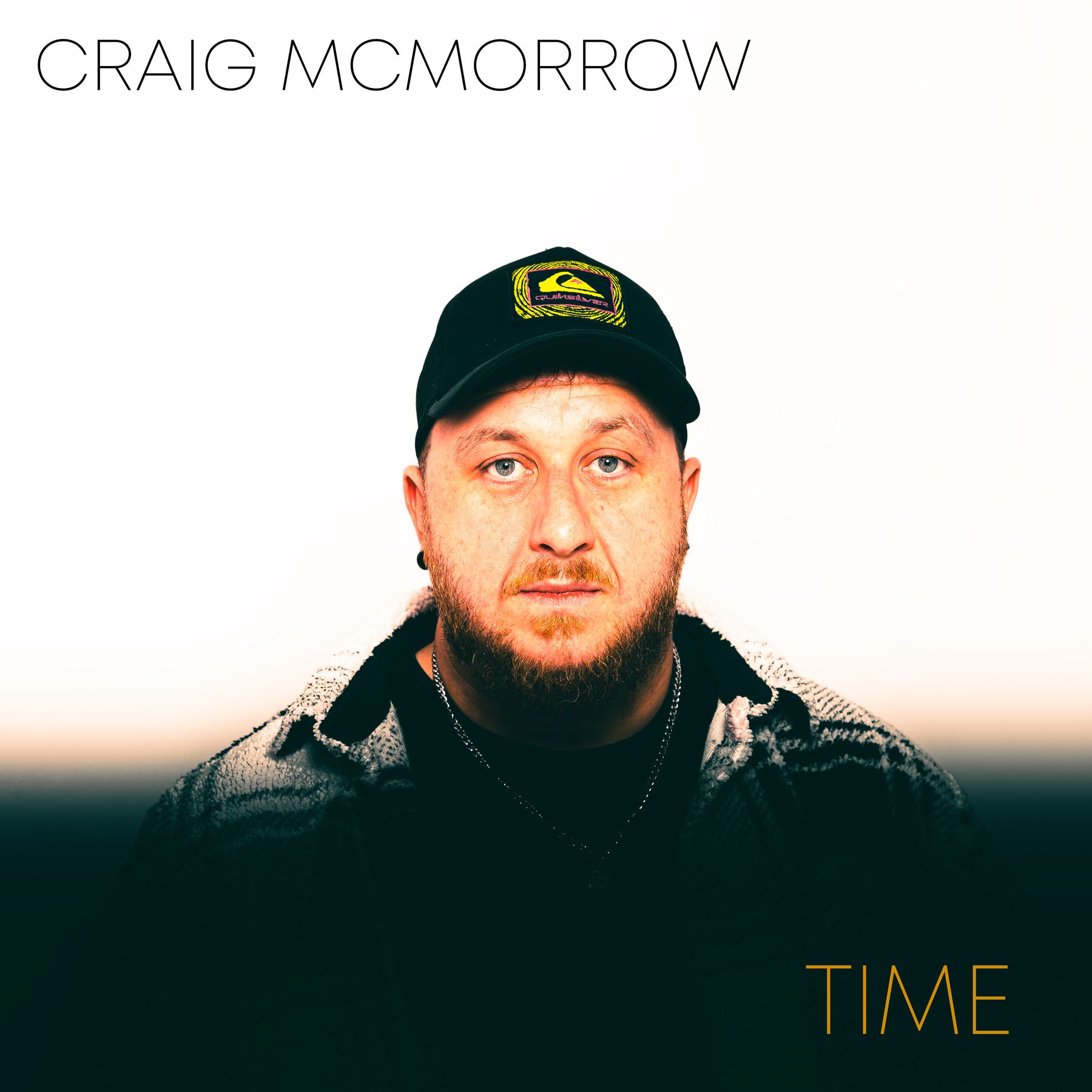 The cover of Craig Morrow's single Time. Showing Craig wearing a black cap and looking at the camera