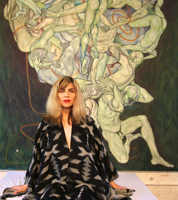 Katy Gunn in front of work by visual Artist Sol Kjøk. Taken for the Whispering Voices exhibition at Last Frontier in Greenpoint.
