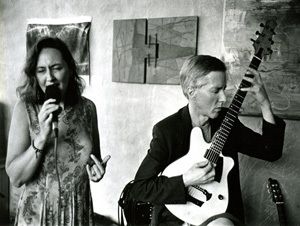 Cheryl with jazz guitar legend, John Stowell, rippin' it in Nelson, BC (1999) Photo by Fred Rosenburg

