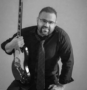 Earl Pavao - Lead guitar and vocals