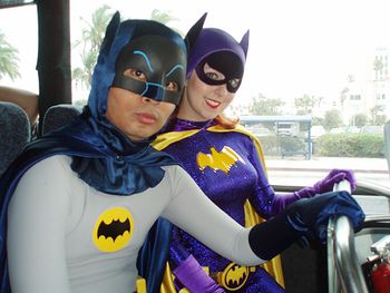 Batman & Batgirl take the BAT-BUS to the convention.
