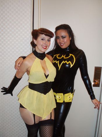 Silk Spectre and Batgirl taking a breather
