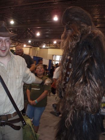 An upset Chewie sees someone dressed as that "OTHER" Harrison Ford character.
