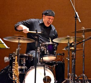 Zottarelli's dazzling drum solos take both audience and ensemble members on a wild adventure filled with unexpected twists and turns.