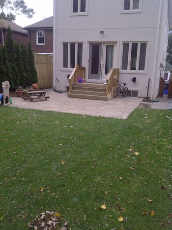 sod, deck, interlocking, walkway on new house
